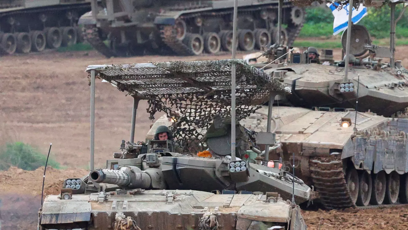 Israeli army tanks manoeuvre near the Israel-Gaza border, amid the ongoing conflict between Israel and the Palestinian Islamist group Hamas, in Israel, January 3, 2024. Reuters/Violeta Santos Moura