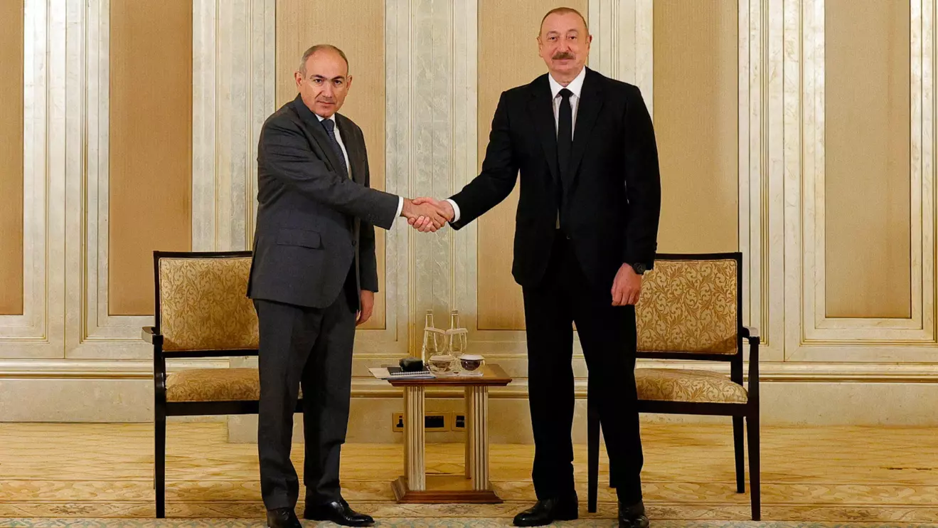 Armenian Prime Minister Nikol Pashinyan and Azerbaijani President Ilham Aliyev meet in Abu Dhabi, United Arab Emirates July 10, 2025. Press Service of Prime Minister of the Republic of Armenia/Handout via Reuters 
