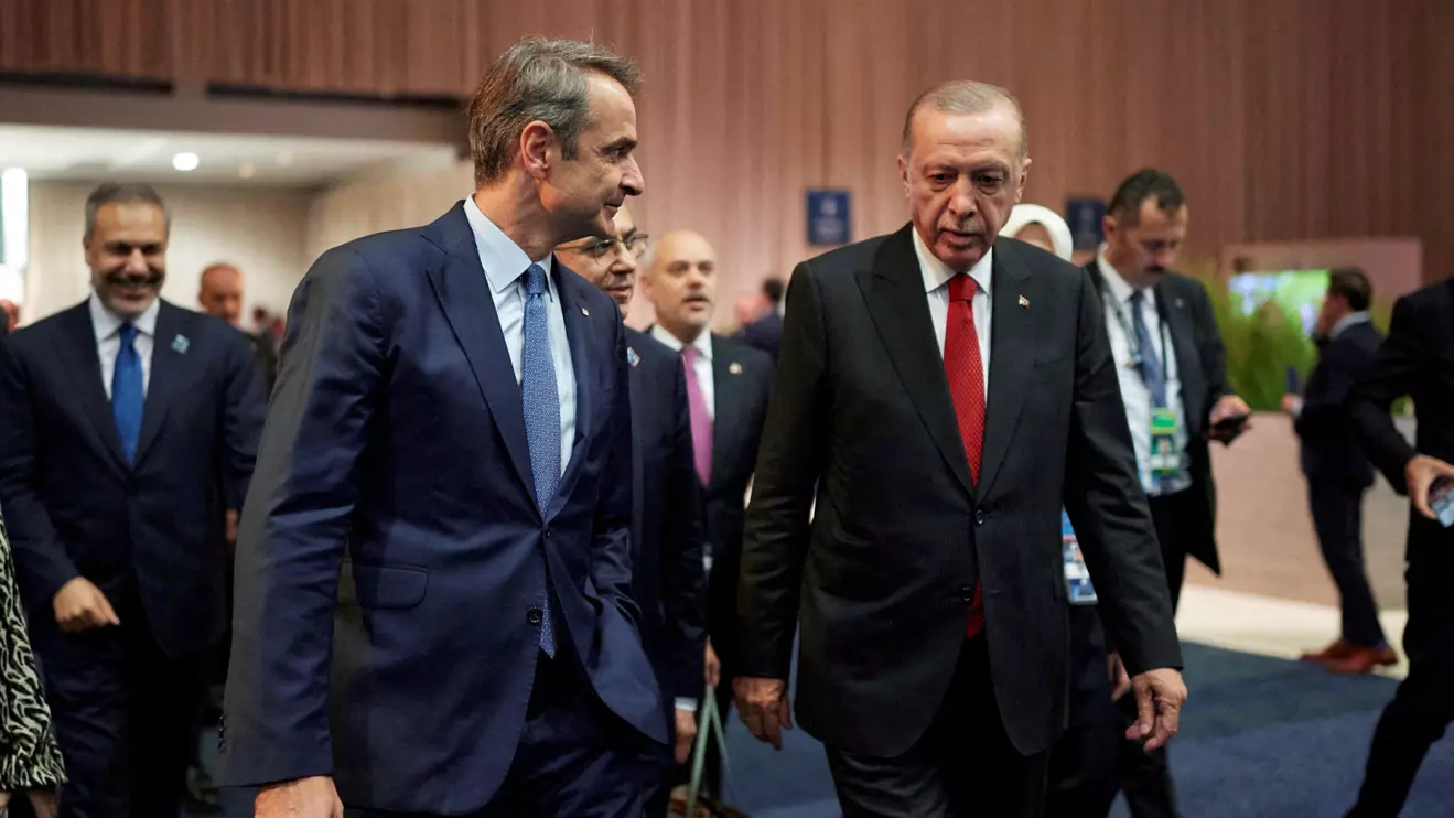 Greek Prime Minister Kyriakos Mitsotakis and Turkish President Tayyip Erdogan meet on the sidelines of NATO Summit, in Washington, United States, July 10, 2024. Dimitris Papamitsos/Greek Prime Minister's Office