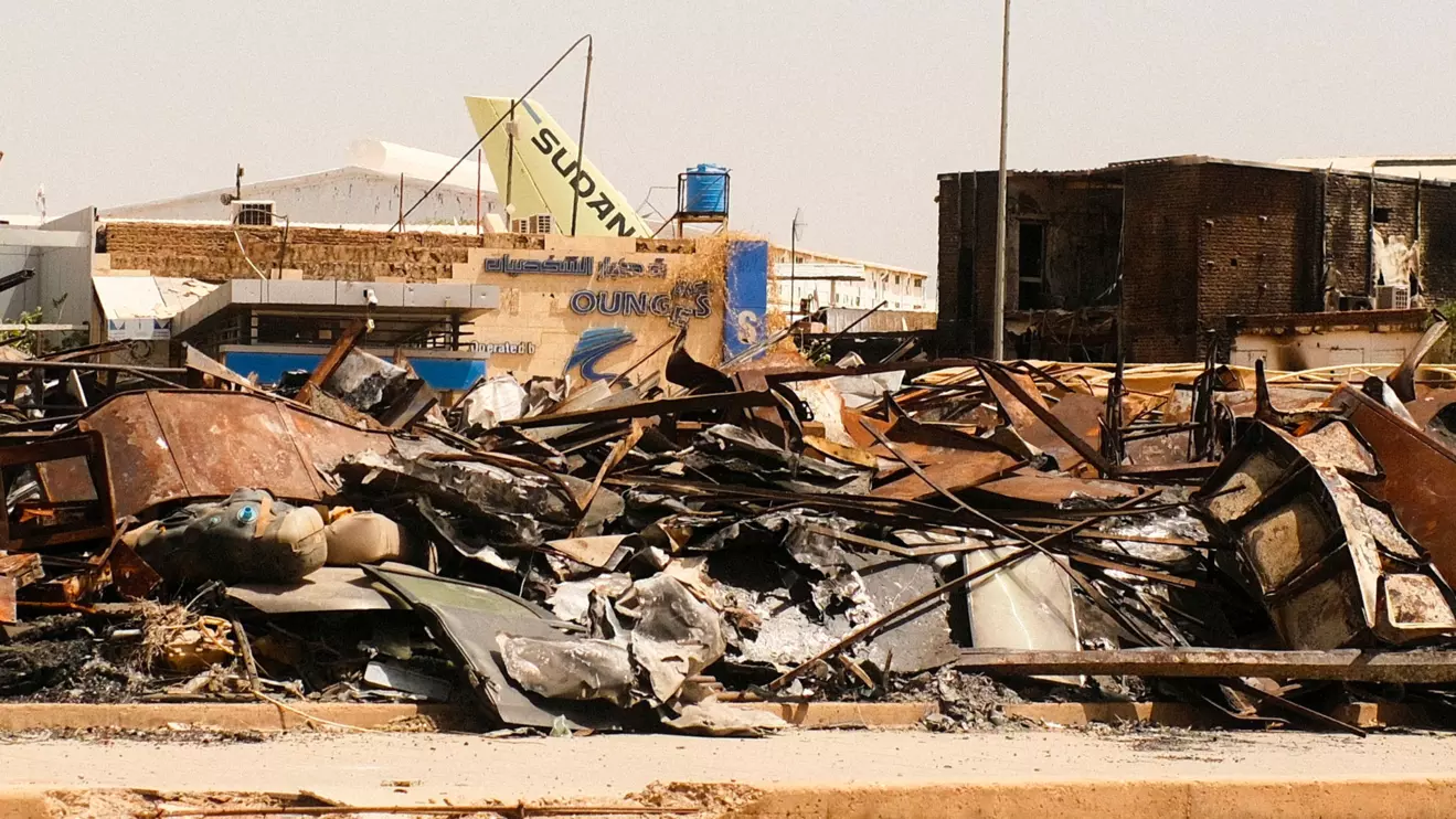 A view of a burned building and the tail of a Sudan Airways aircraft amid debris at Khartoum Airport, after the Sudanese army deepened its control over Khartoum from the Rapid Support Forces (RSF), in Khartoum Sudan April 26, 2025. Reuters/El Tayeb Siddig