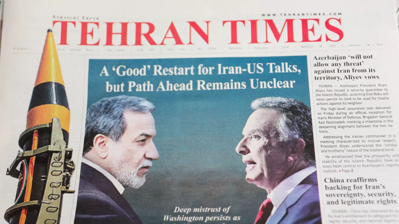An Iranian newspaper with a cover photo of Iran's Foreign Minister Abbas Araqchi and U.S. Middle East envoy Steve Witkoff, in Tehran, Iran, February 7, 2026. Majid Asgaripour/WANA (West Asia News Agency) via Reuters