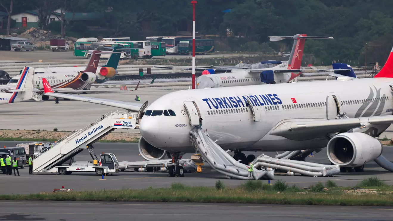 An airbus belonging to Turkish Airlines is parked at Tribhuvan International Airport after a minor fire broke out while landing in Kathmandu, Nepal May 11, 2026. Reuters/Navesh Chitrakar