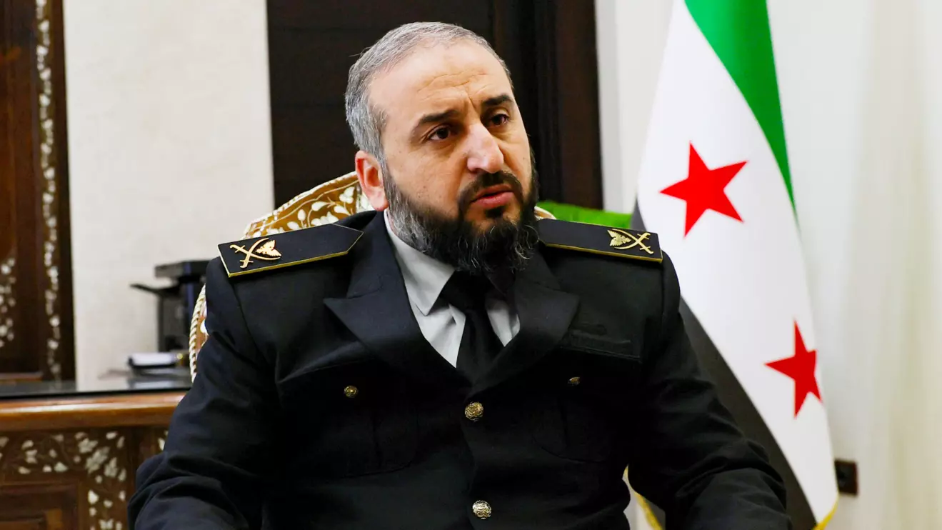 Syria's new defense minister Murhaf Abu Qasra, Reuters/Yamam Al Shaar