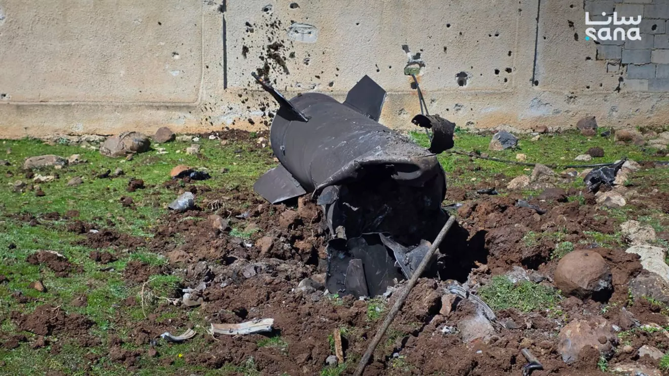 The remains of missile that fell in the village of al-Hiran in the southern countryside of Quneitra © SANA