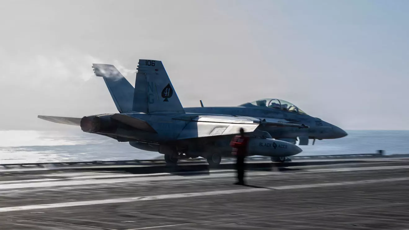 An F/A-18F Super Hornet, attached to Strike Fighter Squadron, launches from the flight deck of Nimitz-class aircraft carrier USS Abraham Lincoln for a mission supporting Operation Epic Fury during the Iran war at an undisclosed location, April 2, 2026. U.S. Navy