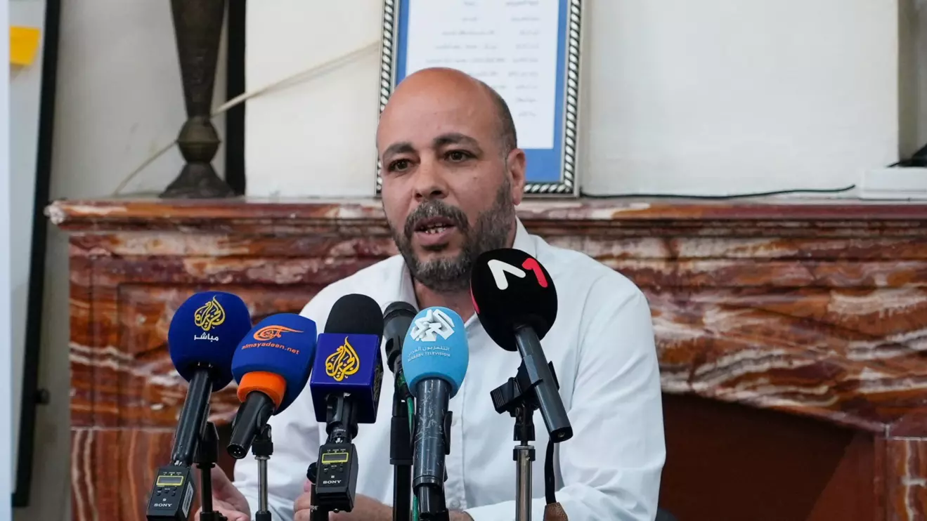 Romdhane Ben Amor of the Tunisian Forum for Economic and Social Rights, an independent advocacy group attends a press conference in Tunis, Tunisia May 9, 2025. Reuters