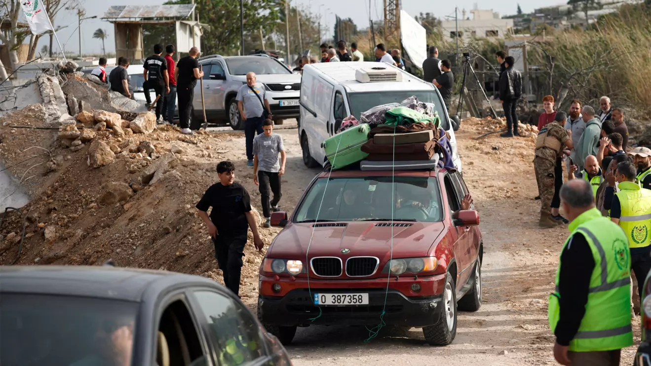 Displaced people make their way back to their homes as they cross the bridge linking southern Lebanon to the rest of the country, which was hit earlier in an Israeli strike, after a 10-day ceasefire between Lebanon and Israel went into effect, in Qasmiyeh, Lebanon, April 17, 2026. Reuters/Louisa Gouliamaki