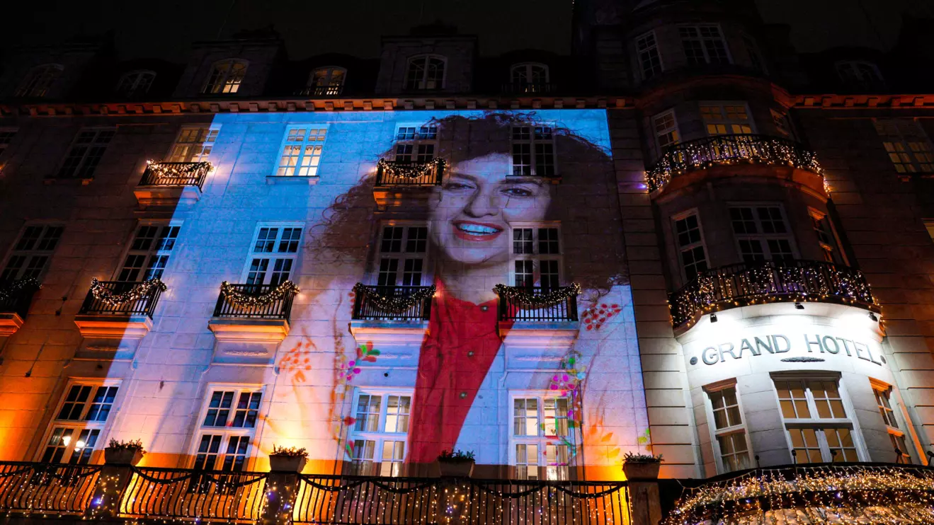 A picture of Nobel Peace Prize winner Narges Mohammadi on the wall of the Grand Hotel in central Oslo before the Nobel banquet, in connection with the awarding of the Nobel Peace Prize 2023, in Oslo, Norway December 10, 2023. NTB/Javad Parsa via Reuters