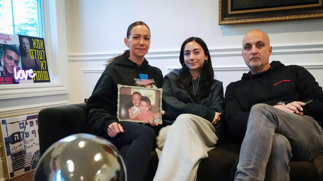 Yael, Adi and Mika Alexander, the family of Edan Alexander, the American-Israeli and Israel Defense Forces soldier taken hostage during the October 7, 2023 attack on Israel by Hamas, pose for a photograph during an interview with Reuters at the Alexander’s home in Tenafly, New Jersey, U.S., December 14, 2024. Reuters/Stephani Spindel