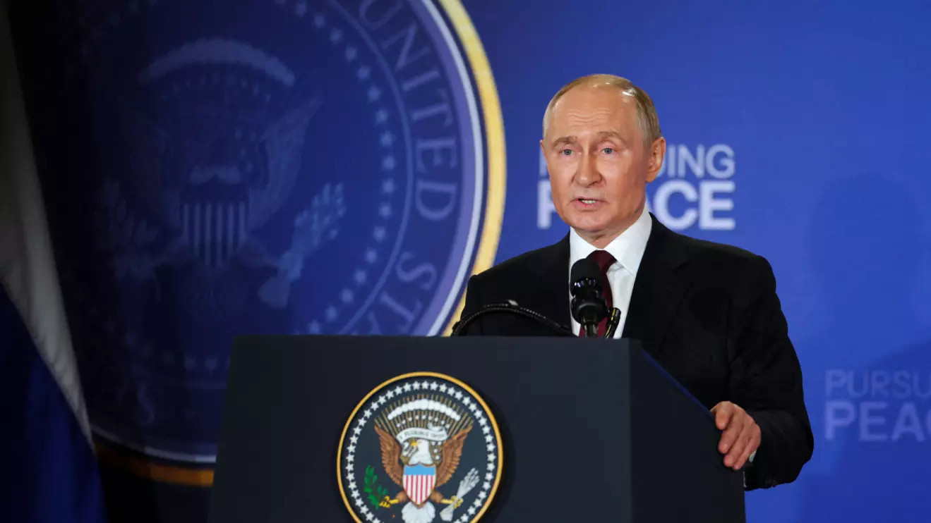 Russian President Vladimir Putin holds a press conference with U.S. President Donald Trump following their meeting to negotiate an end to the war in Ukraine, at Joint Base Elmendorf-Richardson in Anchorage, Alaska, U.S., August 15, 2025. Reuters/Jeenah Moon