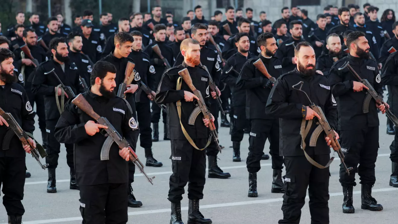 Syrian police members attend their graduation ceremony, after the ouster of Syria's Bashar al-Assad, at the Police Academy under the Syrian Salvation Government, in Damascus, Syria January 14, 2025. Reuters/Khalil Ashawi