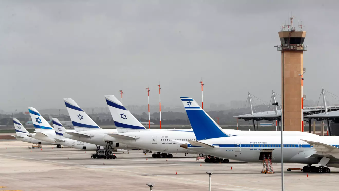 El Al Israel Airlines planes are seen on the tarmac at Ben Gurion International airport in Lod, near Tel Aviv, Israel March 10, 2020. Reuters/Ronen Zvulun