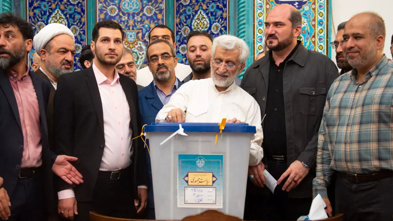 Presidential candidate Saeed Jalili votes at a polling station in a snap presidential election to choose a successor to Ebrahim Raisi following his death in a helicopter crash, in Tehran, Iran June 28, 2024. Stringer/WANA (West Asia News Agency) via Reuters