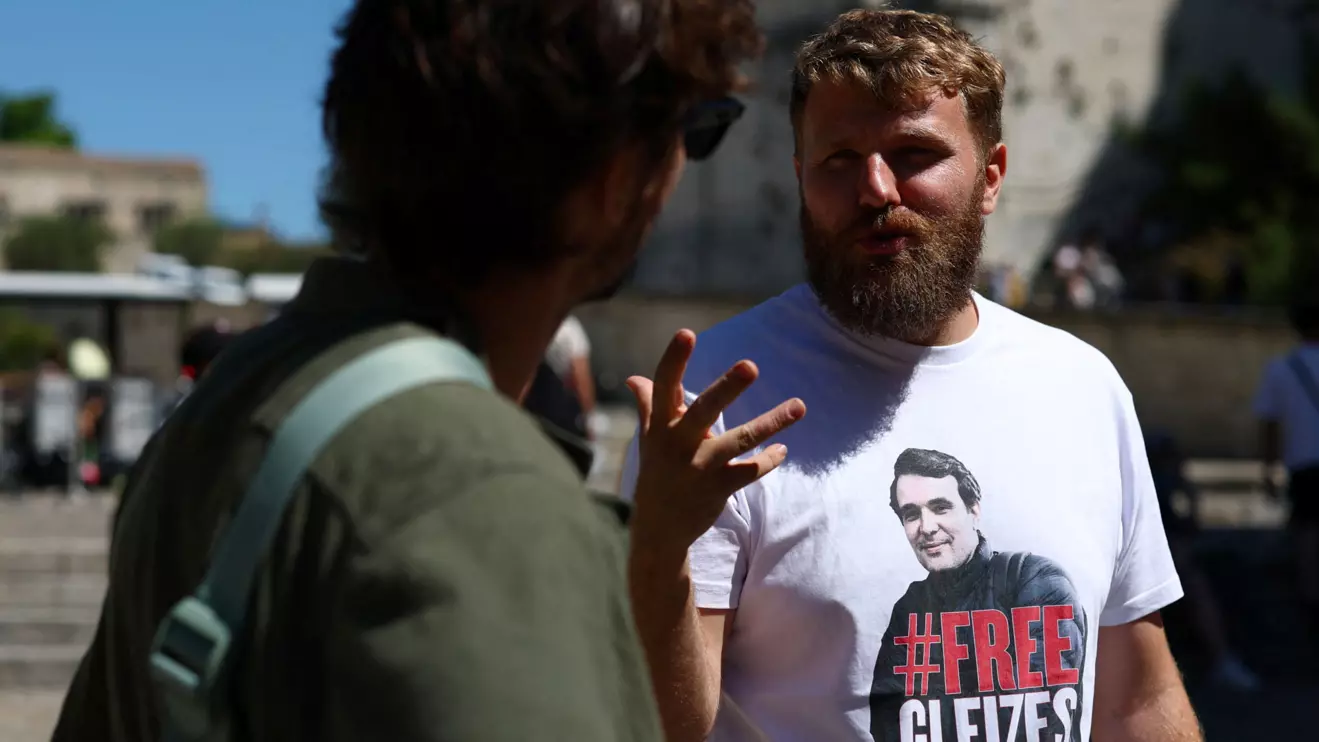 Maxime Gleizes, brother of French journalist Christophe Gleizes, who was sentenced to seven years in prison by an Algerian court, speaks with supporters during a march calling for his brother’s release, in Avignon, France, July 16, 2025. Reuters/Manon Cruz