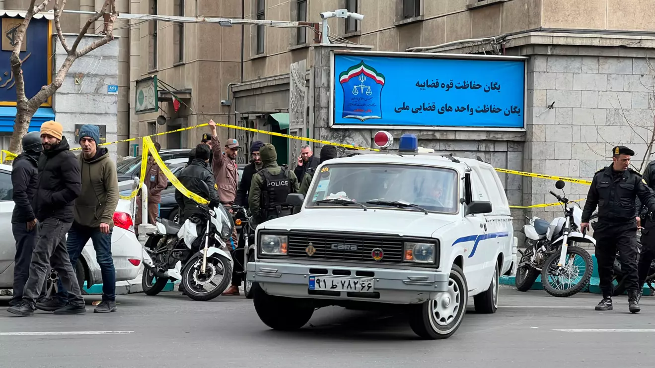 Members of the police stand in front of the judiciary building after the assassination of the Supreme Court Judges Mohammad Moghiseh and Ali Razini in Tehran, Iran, January 18, 2025. WANA (West Asia News Agency) via Reuters