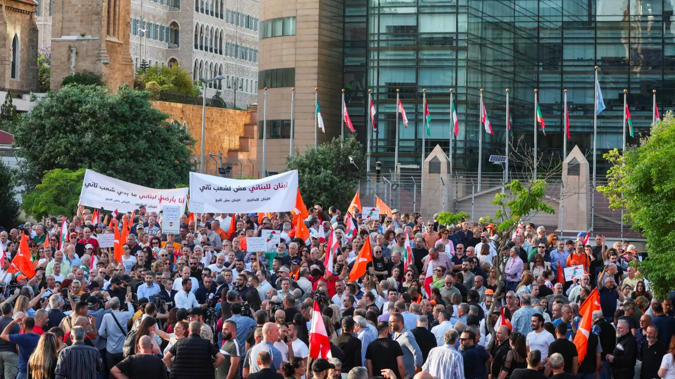Demonstrators carry flags and banners during an anti-Syrian refugee rally organized by Lebanon's Free Patriotic Movement party near the ESCWA building in Beirut, May 9, 2024. Reuters/Mohamed Azakir