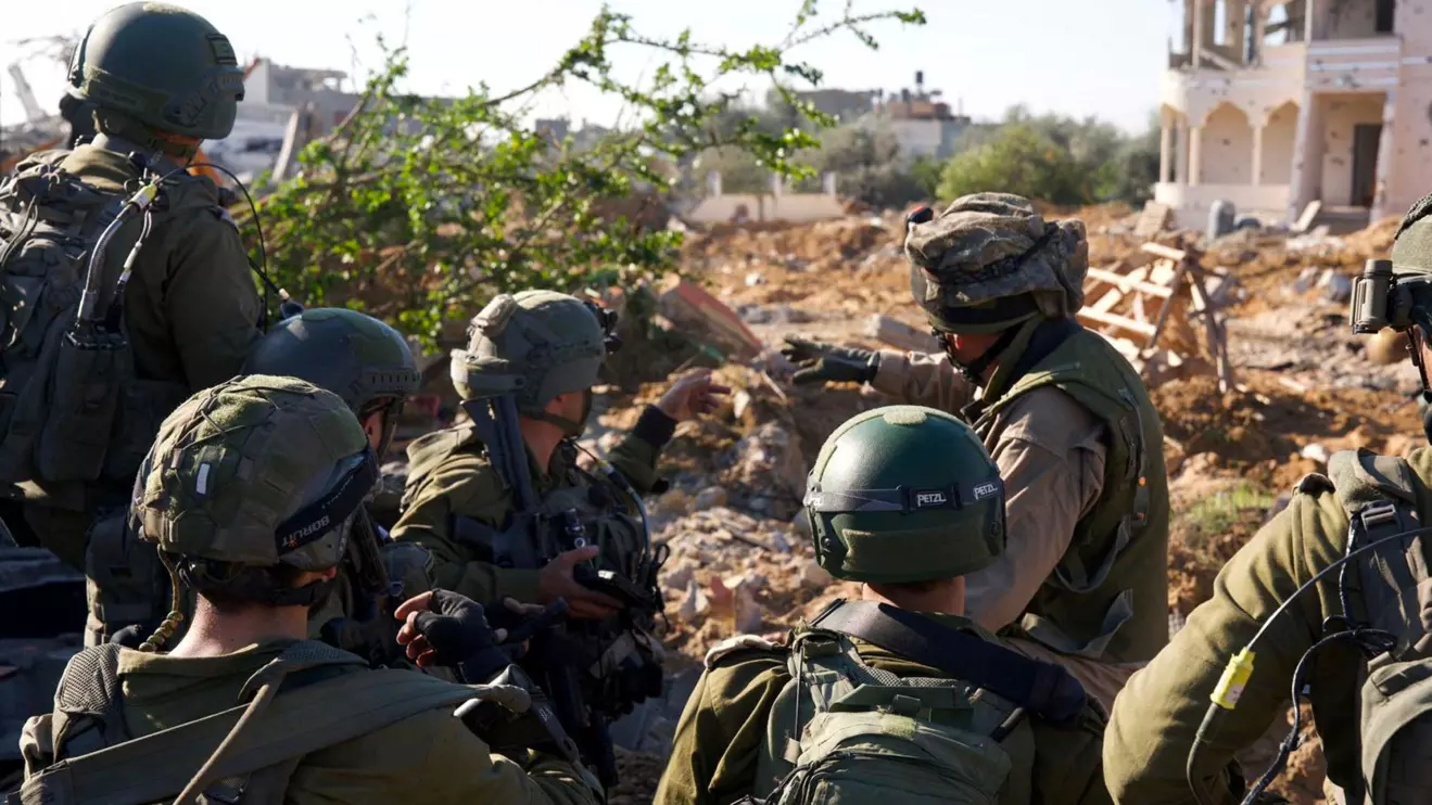 Israeli soldiers operate in the Gaza Strip amid the ongoing conflict between Israel and the Palestinian Islamist group Hamas, in this undated handout picture released on February 24, 2024. Israel Defense Forces/Handout via Reuters