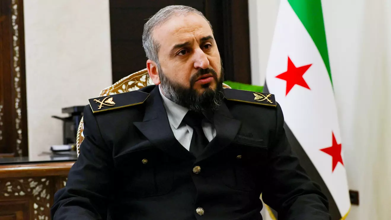 Syria's new defense minister Murhaf Abu Qasra attends an interview with Reuters in Damascus, Syria January 19, 2025. Reuters/Yamam Al Shaar