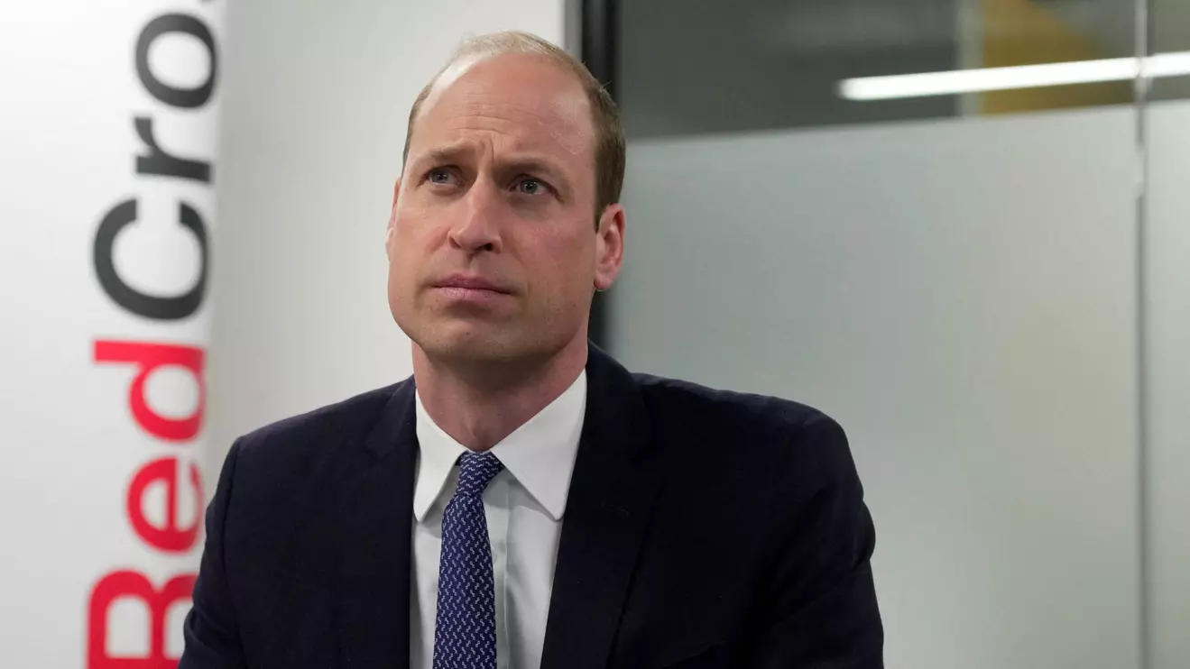 Britain's William, Prince of Wales, listens as he visits the British Red Cross at its headquarters in London, Britain, February 20, 2024. Kin Cheung/Pool via Reuters