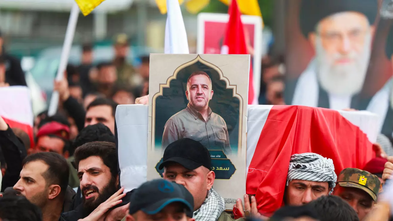 Mourners carry the coffin of Saad al-Baiji, the Popular Mobilisation Forces' Anbar operations commander, who was killed in airstrikes that targeted a PMF site in Iraq's western Anbar province, during his funeral, in Baghdad, Iraq, March 24, 2026. Reuters/Ahmed Saad