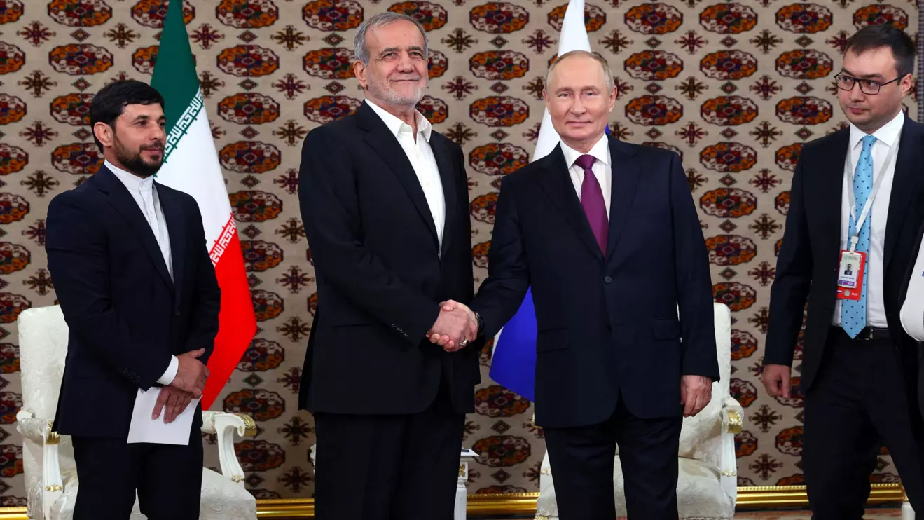 Russian President Vladimir Putin meets Iranian counterpart Masoud Pezeshkian on the sidelines of a cultural forum dedicated to the 300th anniversary of the birth of the Turkmen poet and philosopher Magtymguly Fragi, in Ashgabat, Turkmenistan October 11, 2024. Sputnik/Alexander Scherbak/Pool via Reuters