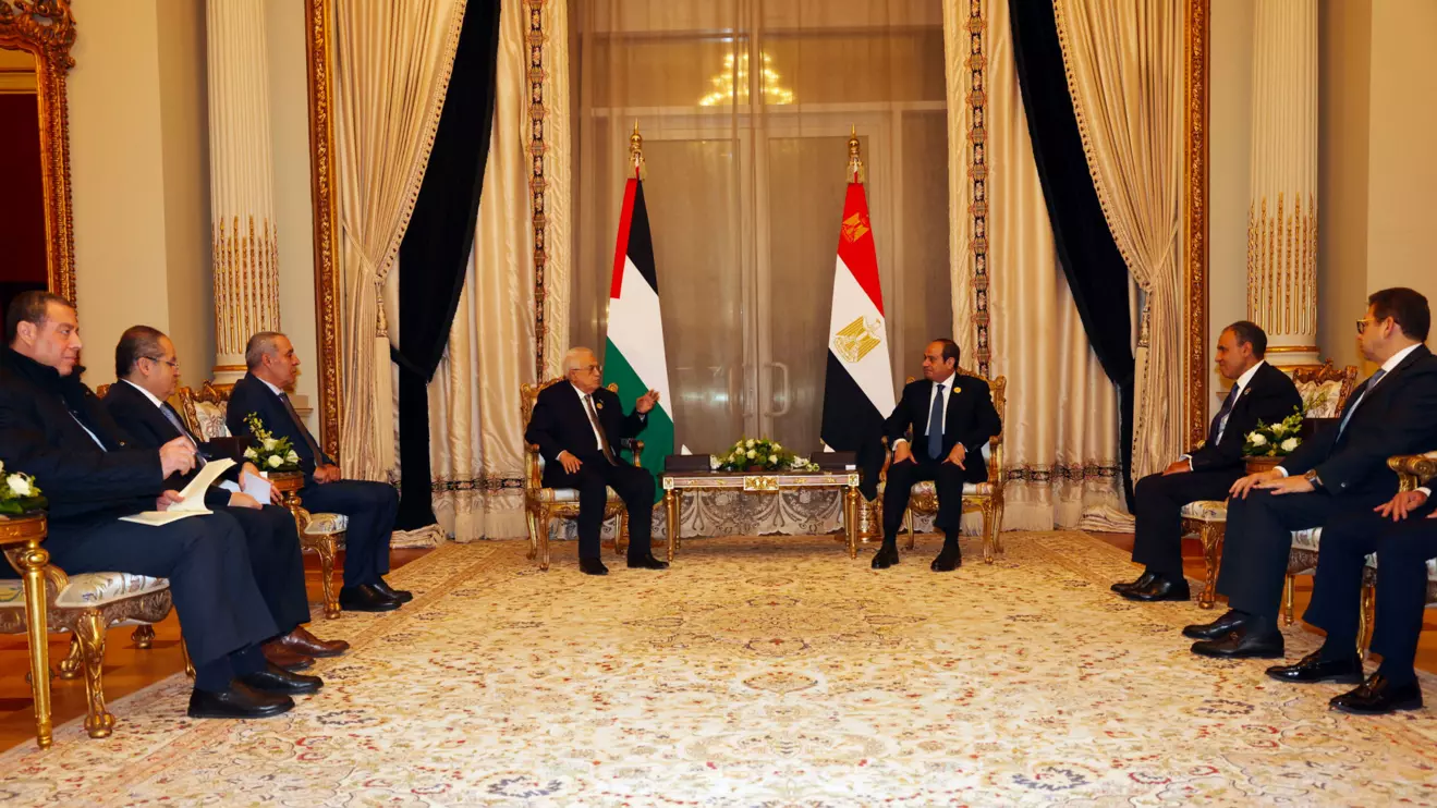 Palestinian President Mahmoud Abbas meets with the Egyptian President Abdel Fattah al-Sisi, during the emergency Arab summit organised by Egypt this week, in Cairo, Egypt March 4, 2025. Palestinian President Office