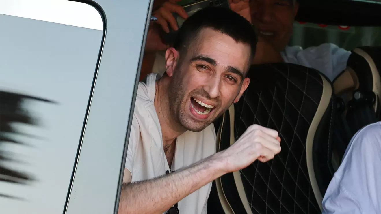 Released hostage Avinatan Or, who was kidnapped during the deadly October 7, 2023 attack by Hamas and taken to Gaza, reacts upon arrival at the site of Rabin Medical Center-Beilinson Hospital, amid a hostages-prisoners swap and a ceasefire deal between Israel and Hamas in Gaza, in Petah Tikva, Israel October 13, 2025. Reuters/Stoyan Nenov