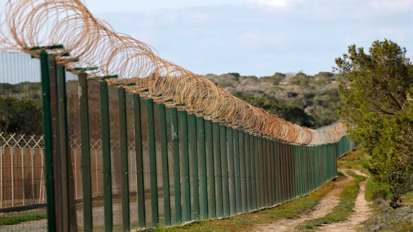 A fence at the entrance of RAF Akrotiri, a British sovereign base in Cyprus that was hit by a drone early Monday, causing limited damage, in Cyprus March 4, 2026. Reuters/Yiannis Kourtoglou