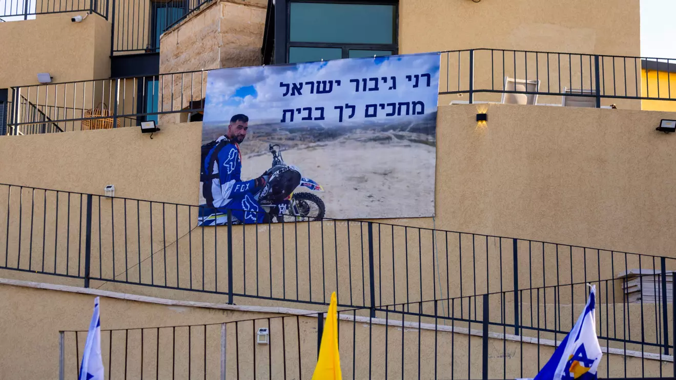 A sign depicting Ran Gvili, the last hostage remaining in Gaza following the deadly October 7, 2023 attack by Hamas. Reuters/Ronen Zvulun