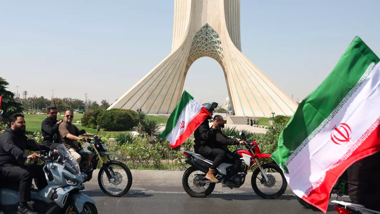Members of Iranian militia forces (Basij) ride on motorcycles as they participate in a march in Tehran, Iran, September 25, 2026. Majid Asgaripour/WANA (West Asia News Agency) via Reuters