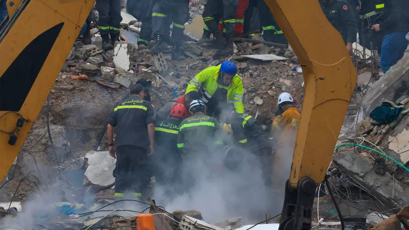 Rescue workers work at the site where a residential building collapsed in Tripoli, Lebanon, February 9, 2026. Reuters/Mohammed Azakir