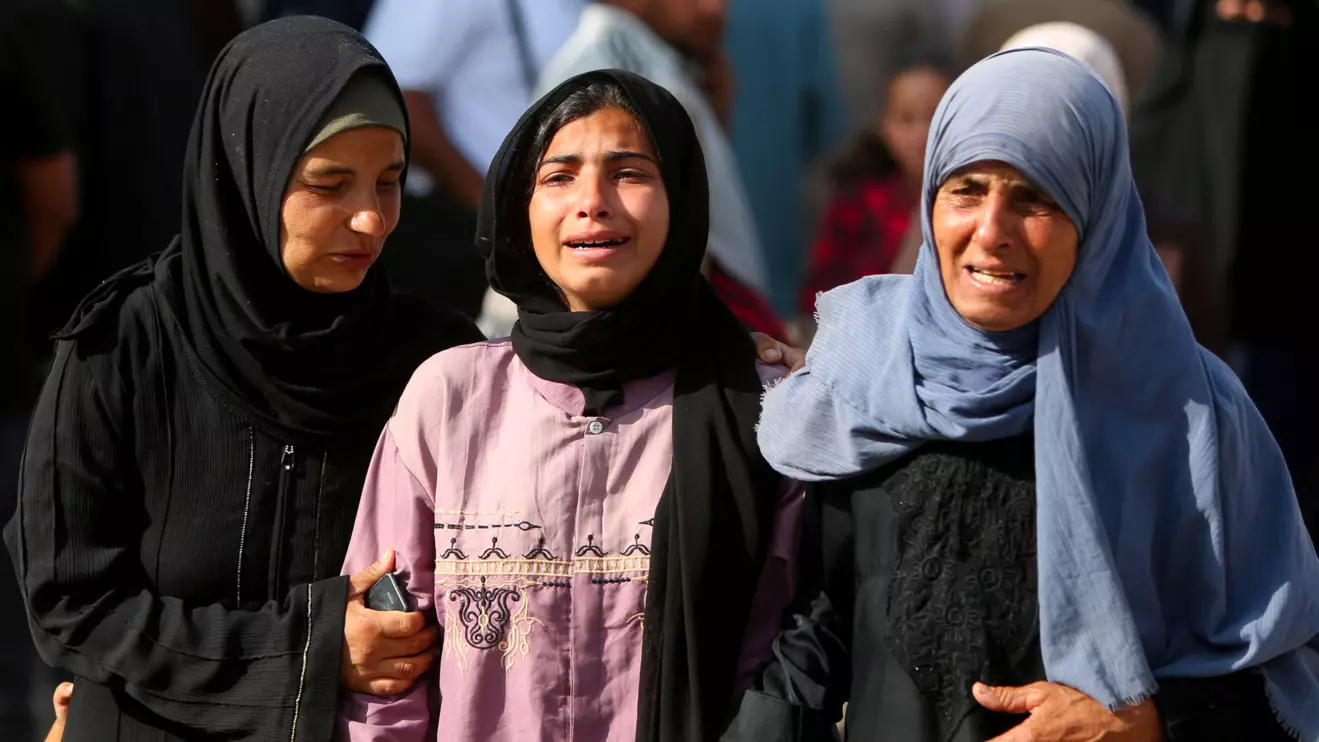 Mourners react during the funeral of Palestinians killed in Israeli strikes, at Nasser hospital, in Khan Younis, in the southern Gaza Strip, June 1, 2025. Reuters/Hatem Khaled. This photo is a montage created by Hamas’s communications department.