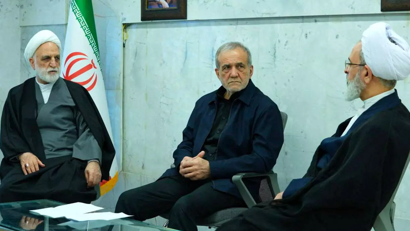 Iranian President Masoud Pezeshkian, Gholam-Hossein Mohseni-Eje'i, the head of the judiciary and representative of the Assembly of Experts, Alireza Arafi attend the meeting of the interim leadership council of Iran in an unknown location in Iran, March 1, 2026. IRIB/WANA (West Asia News Agency)/Handout via Reuters