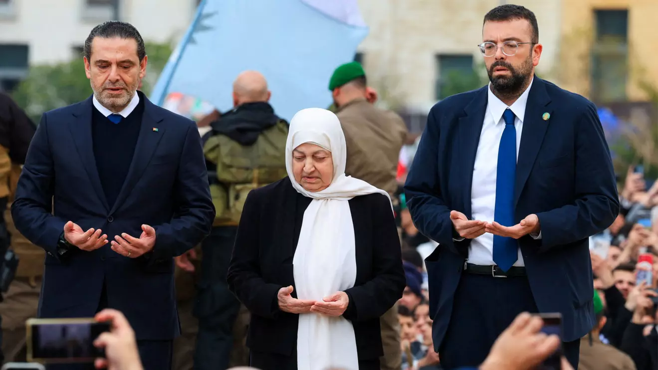 Family members of former Lebanese Prime Minister Rafik al-Hariri, his son Saad al-Hariri, his sister Bahiya al-Hariri and her son Ahmad al-Hariri, pray during an event to mark the 21st anniversary of Rafik al-Hariri's assassination, in Beirut, Lebanon, February 14, 2026. Reuters/Mohamed Azakir