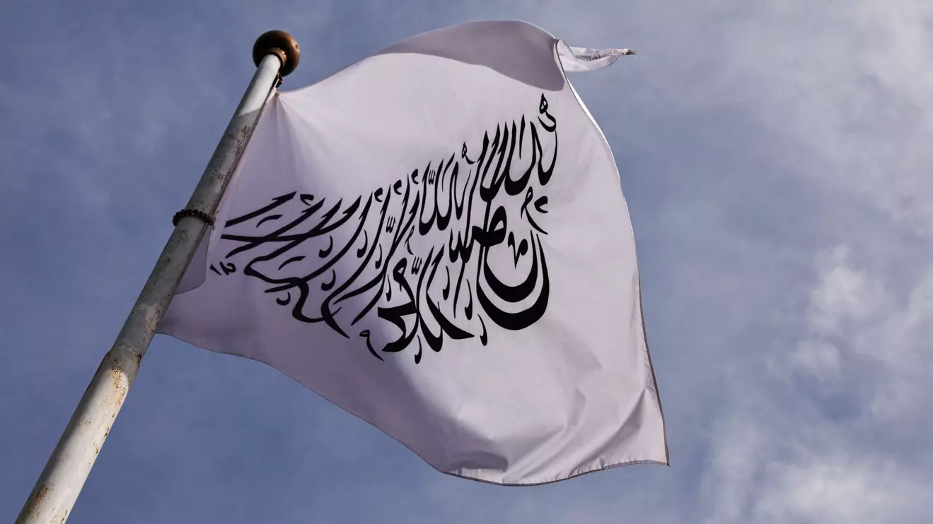 A flag of the Islamic Emirate of Afghanistan, Reuters/Tingshu Wang