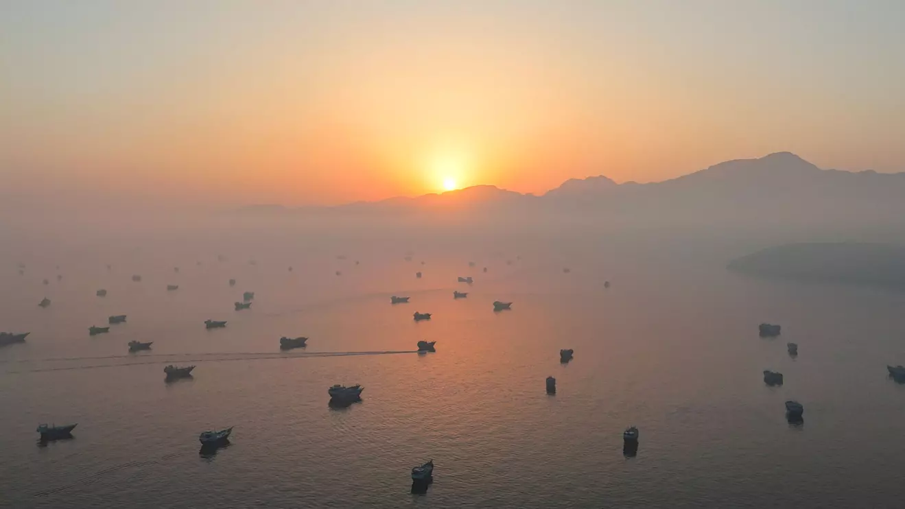 A drone view shows vessels in the Strait of Hormuz, as seen from Musandam, Oman, June 15, 2026. Reuters