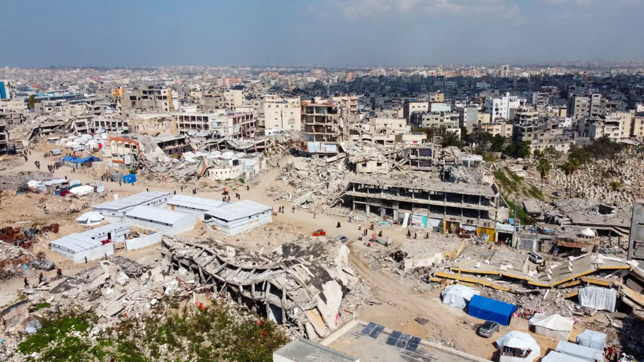 A drone view shows displaced Palestinians sheltering in tents set up near the rubble of buildings destroyed during the Israeli offensive, amid a ceasefire between Israel and Hamas, in Gaza City February 17, 2025. Reuters/Dawoud Abu Alkas