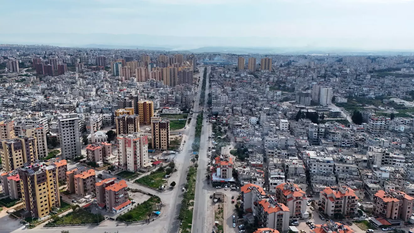 A drone view shows residential buildings as Syrian security forces battle against a nascent insurgency by fighters from ousted leader Bashar al-Assad's Alawite sect, in Latakia, Syria March 7, 2025. Reuters/Karam al-Masri