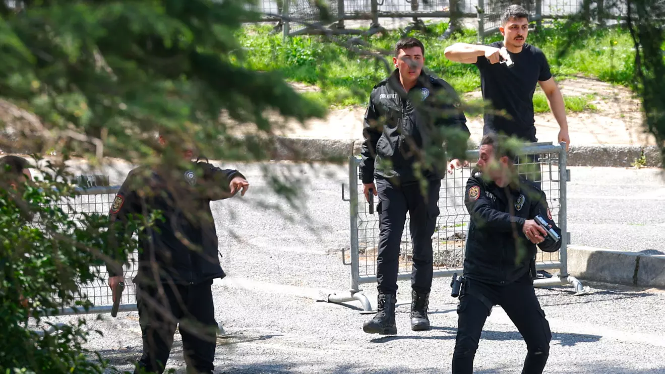 Police in action at the scene, after gunfire was heard near the building housing the Israeli consulate, according to a witness, in Istanbul, Turkey, April 7, 2026. Reuters/Murad Sezer