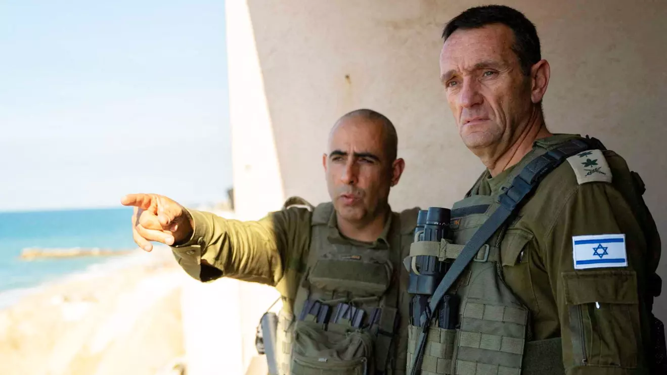 Israeli army Chief of Staff, Herzi Halevi listens to an officer as he visited soldiers during the ongoing ground operation of the Israeli army against Palestinian Islamist group Hamas, in a location given as Gaza, in this handout image released on November 16, 2023. Israel Defense Forces/Handout via Reuters
