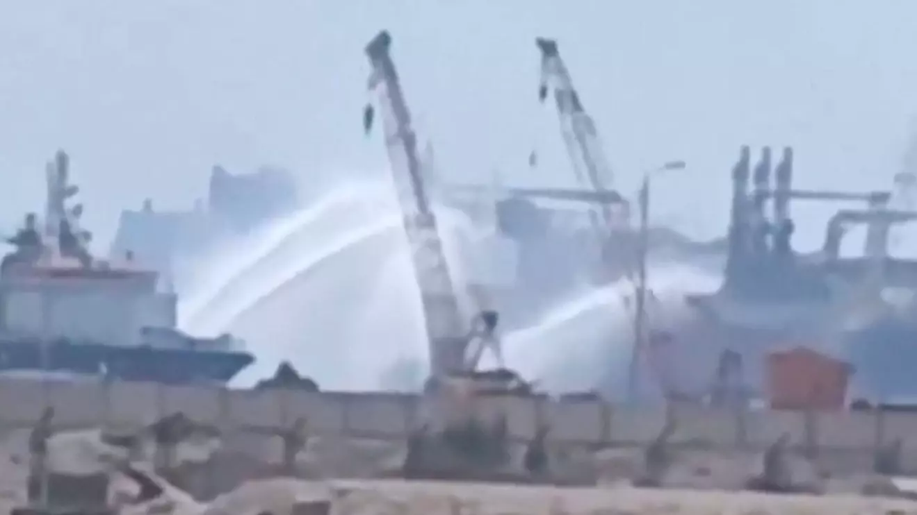 Water jets are fired at a gas tanker after a drone strike, maritime security firm Ambrey said, at Damietta port, Egypt, July 29, 2026, in this screengrab obtained from a social media video