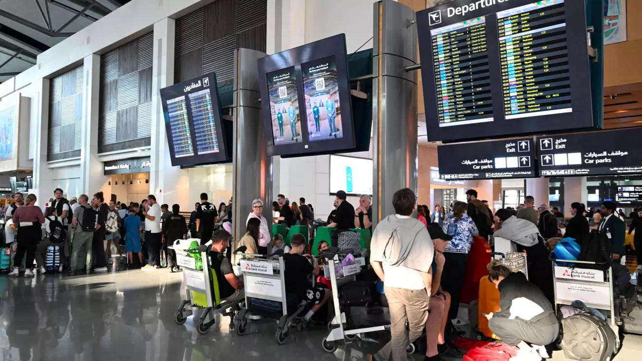 Passengers wait at Muscat International Airport as the Sultanate of Oman facilitates the return of passengers to their home countries amid the U.S.-Israeli conflict with Iran, in Muscat, Oman, March 5, 2026. Oman News Agency