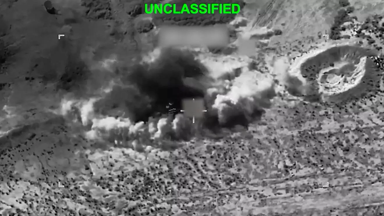 Smoke rises from an explosion at an unknown location, during what U.S. Central Command (CENTCOM) says are strikes on Iran, in this screen grab taken from a handout video released on July 14, 2026. U.S. Central Command/Handout via Reuters