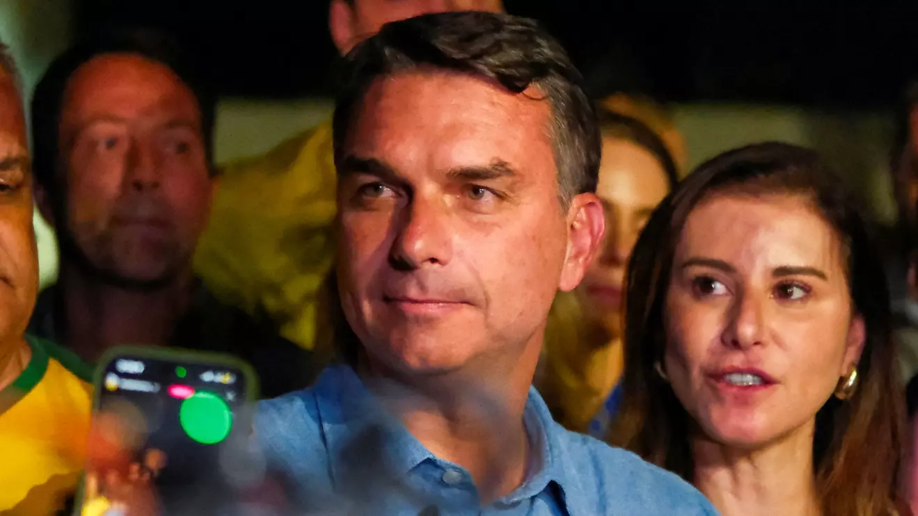 Brazil's presidential candidate Flavio Bolsonaro of the Liberal Party (PL) reacts after the country's electoral authority said he will face President Luiz Inacio Lula da Silva in the runoff of a presidential election, in Brasilia, Brazil, October 4, 2026. Reuters/Diego Herculano