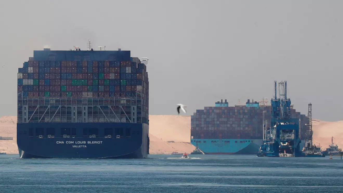 CMA CGM Louis Bleriot and a Maersk Line container ship pass through the Suez Canal in Ismailia, Egypt,  Reuters/Amr Abdallah Dalsh