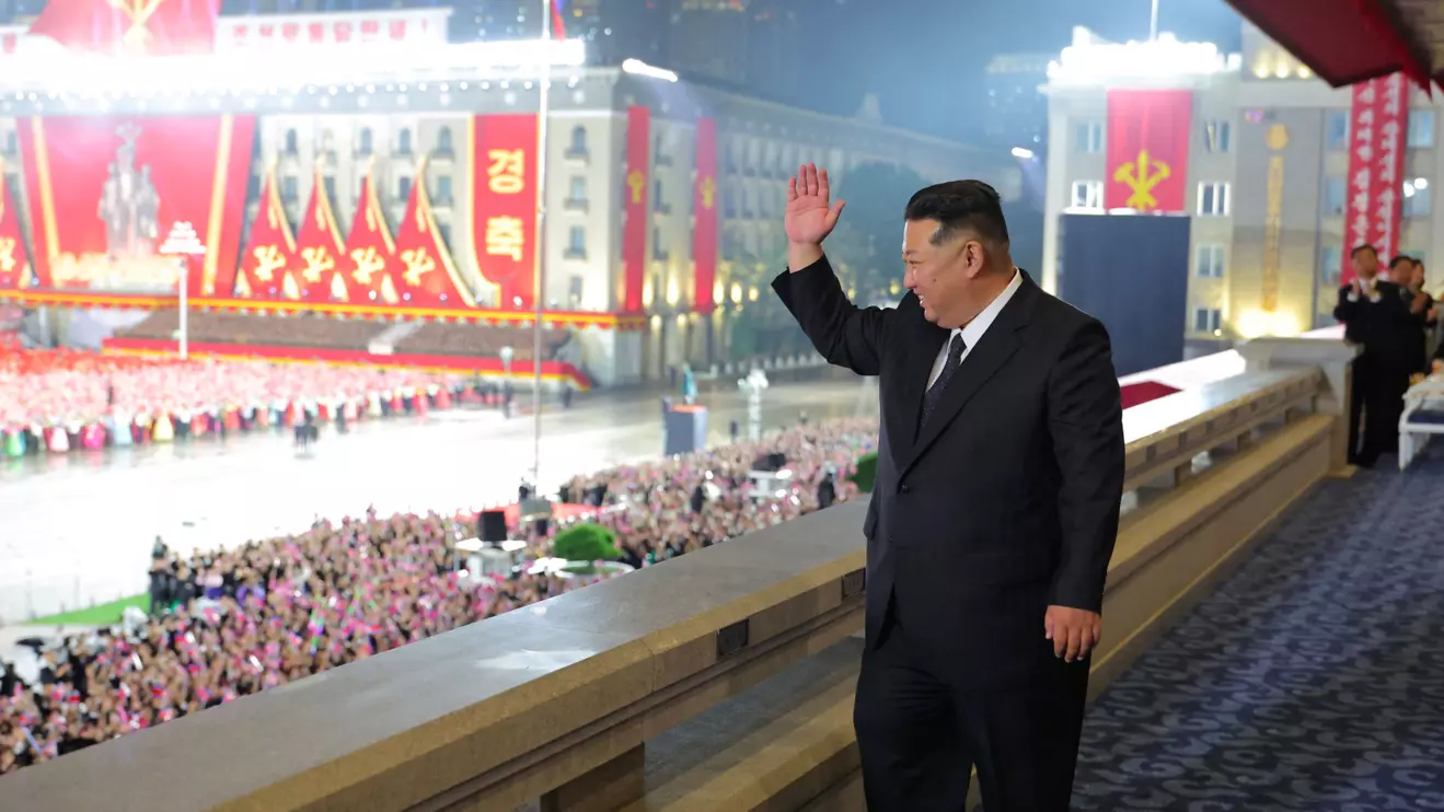 North Korean leader Kim Jong Un gestures during a military parade celebrating the 80th anniversary of the founding of the ruling Workers' Party of Korea (WPK), in Pyongyang, North Korea, in this pictured released October 11, 2025 by North Korea's official Korean Central News Agency. KCNA via Reuters