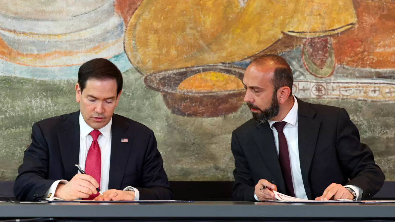 U.S. Secretary of State Marco Rubio and Armenian Foreign Minister Ararat Mirzoyan sign documents following their talks at an airport in Yerevan, Armenia, May 26, 2026. Hayk Baghdasaryan/Photolure via Reuters