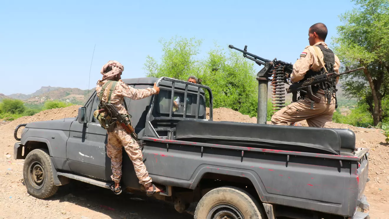 Members of the Saudi-backed Yemeni government forces ride on a military pick-up vehicle as they patrol a road leading to a frontline of clashes with Iran-aligned Houthi fighters, in Taiz province, Yemen, September 30, 2026. Reuters/Ebrahim Al-Suhaibi