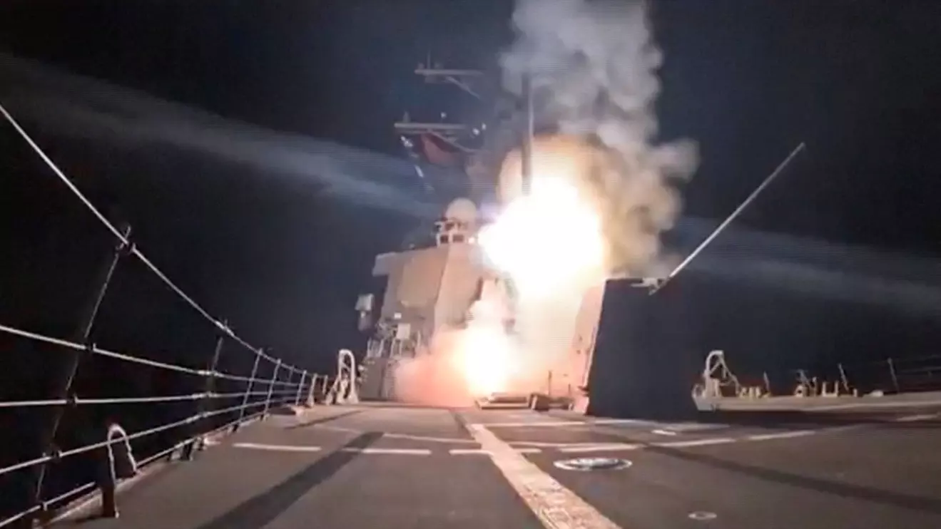 A missile is launched from a military vessel at an unidentified location, in this screen grab obtained from a handout video released by the Department of War on December 25, 2025. U.S. Department of War Via X