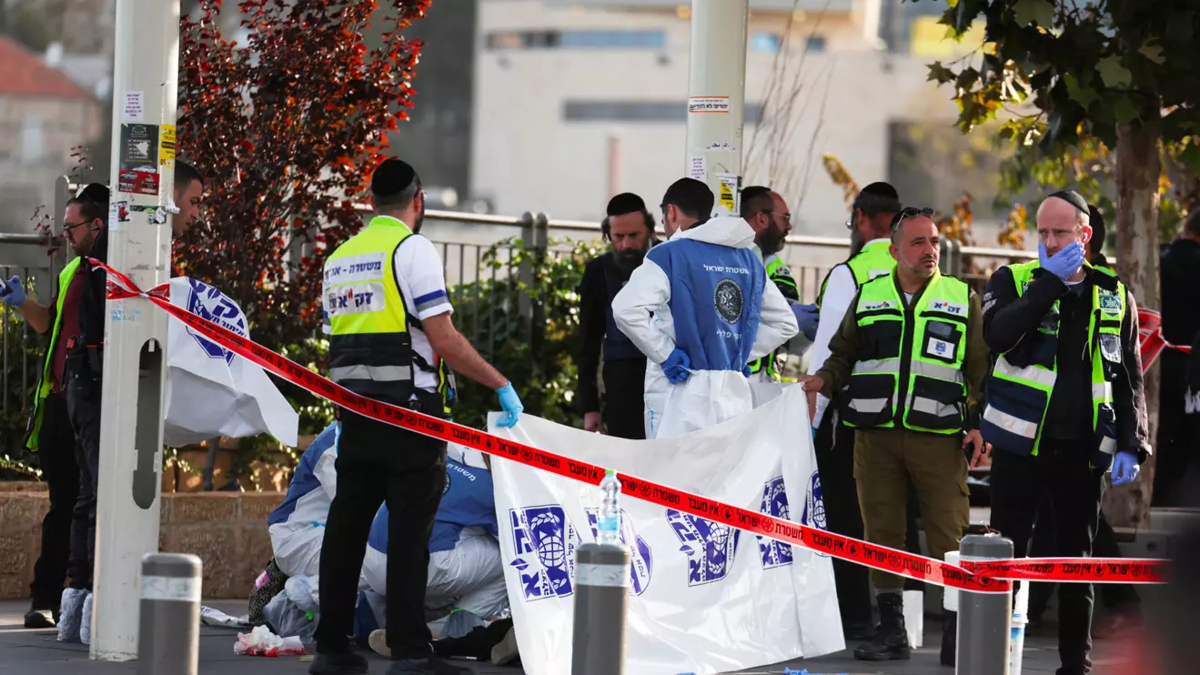 Israeli officials work at the scene of a violent incident in Jerusalem November 30, 2023 Reuters/Ronen Zvulun
